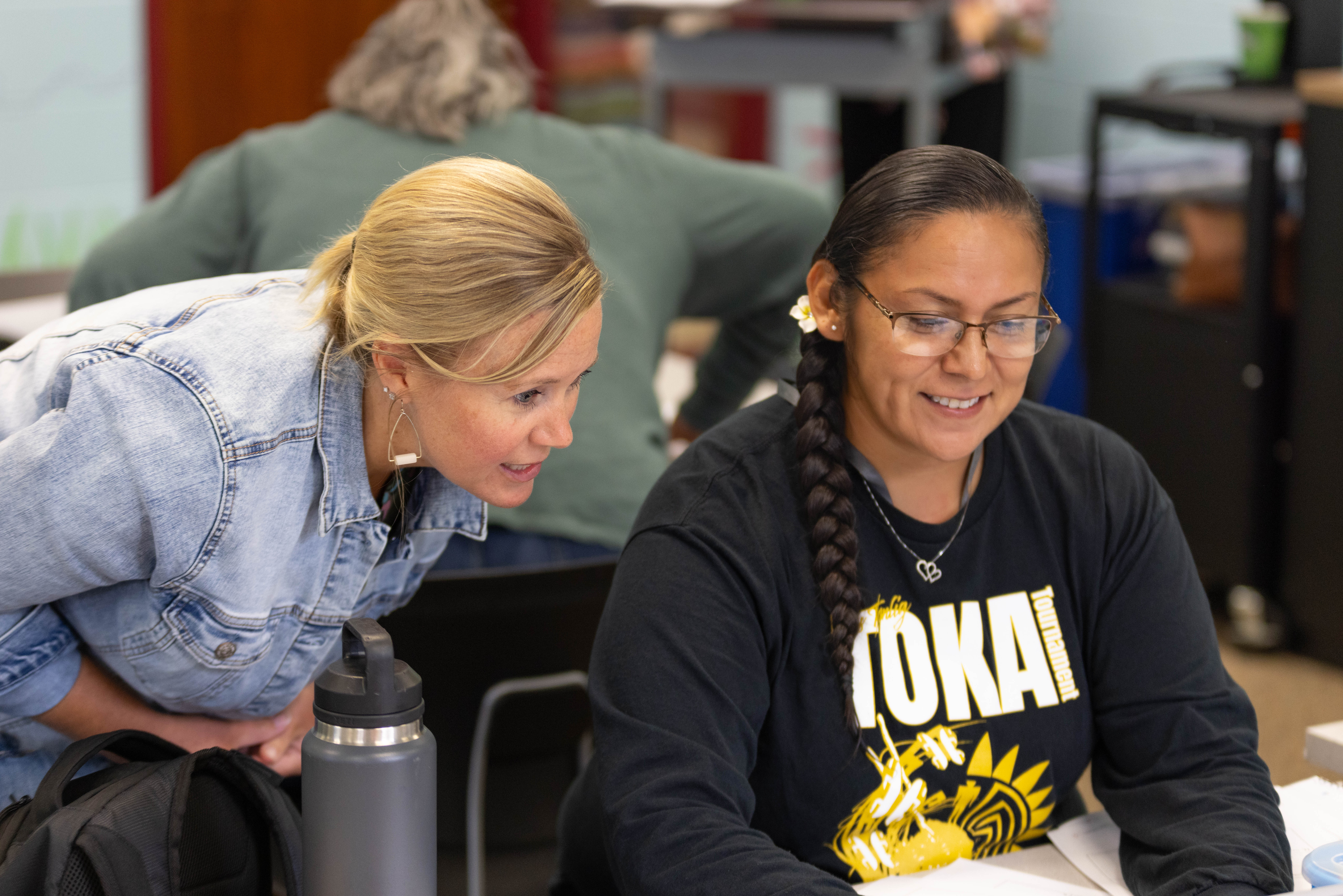 April with faculty during summer class.
