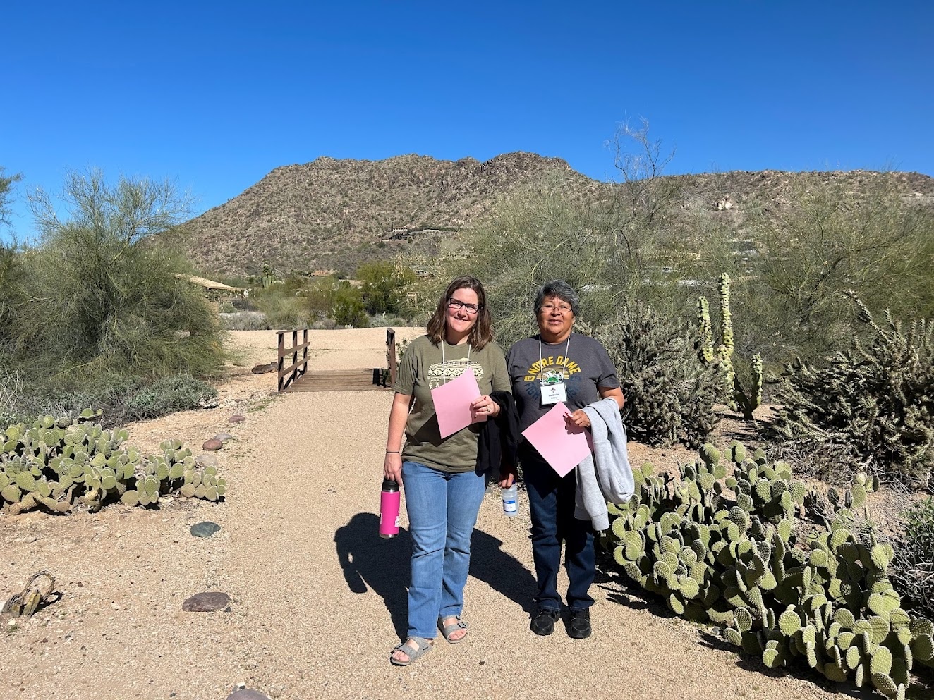 Members of AICSN schools walking at Franciscan Renewal Center in Scottsdale