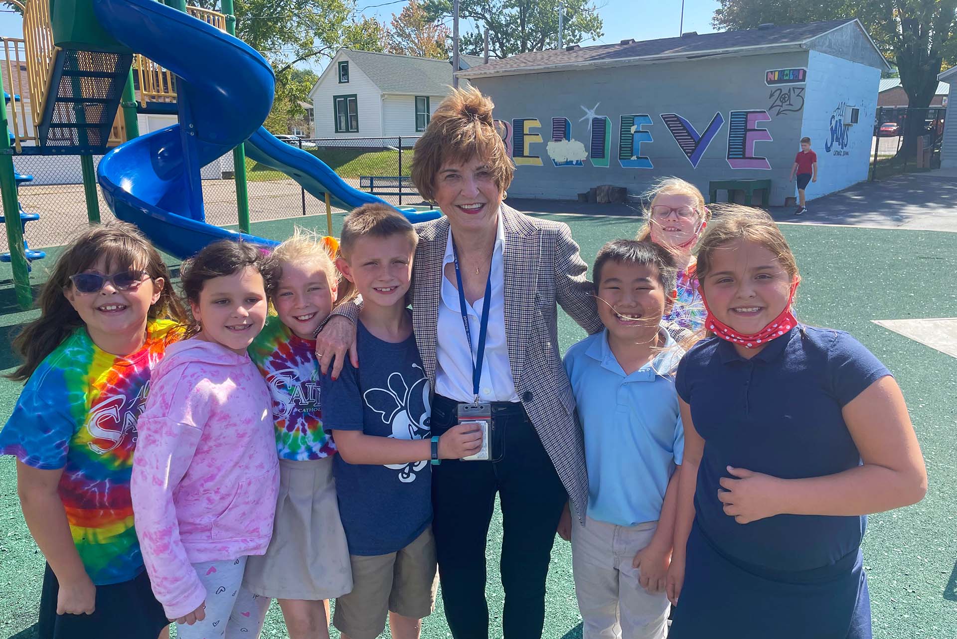 Jeanne Von Feldt with kids on playground