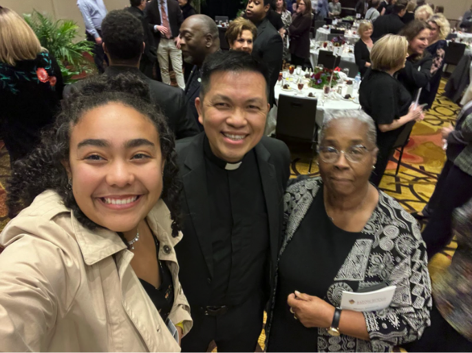 Sydney Brown with other staff members