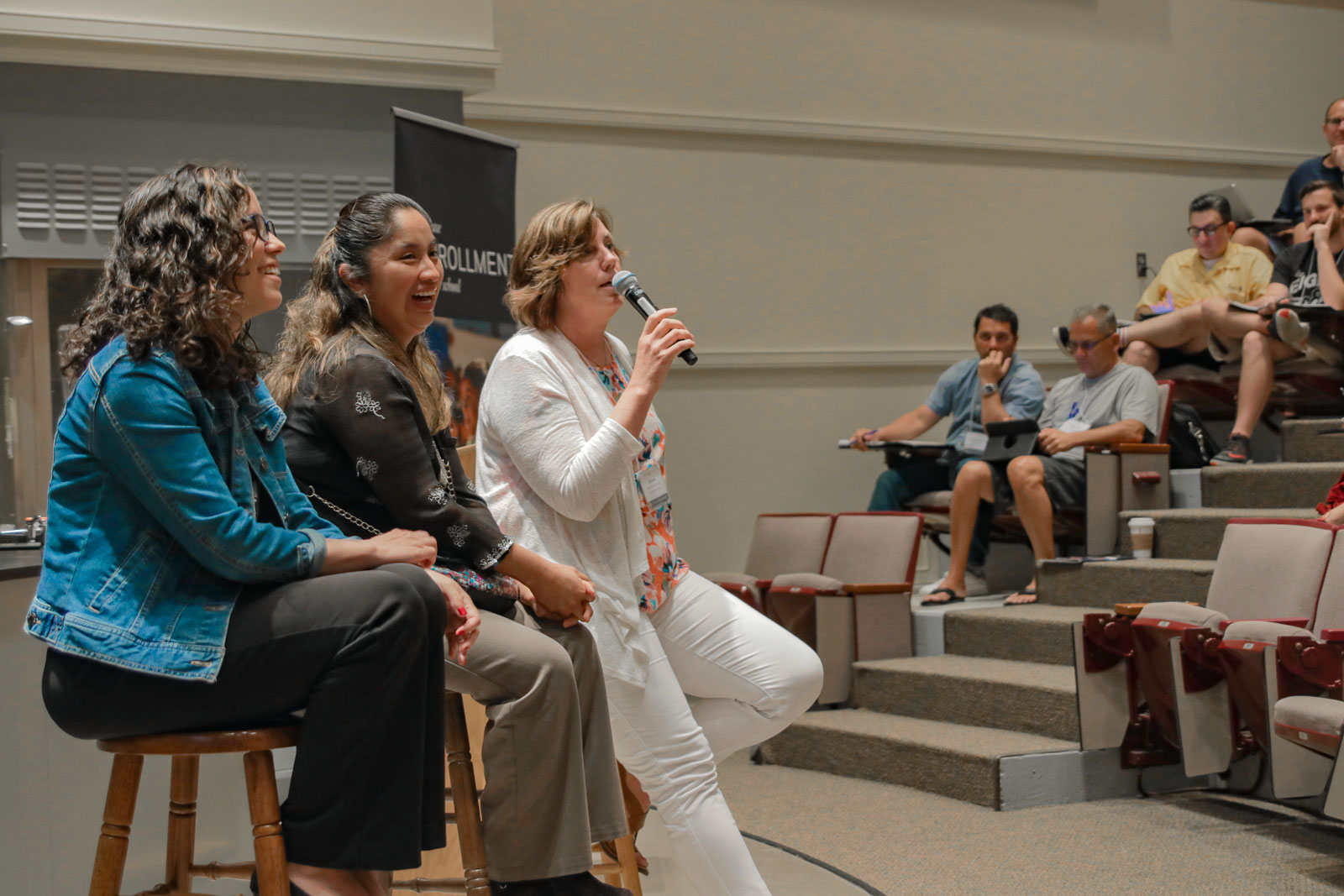 Women speaking to audience