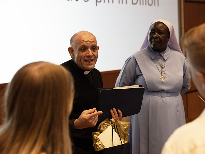 Fr. Bechina speaks to students