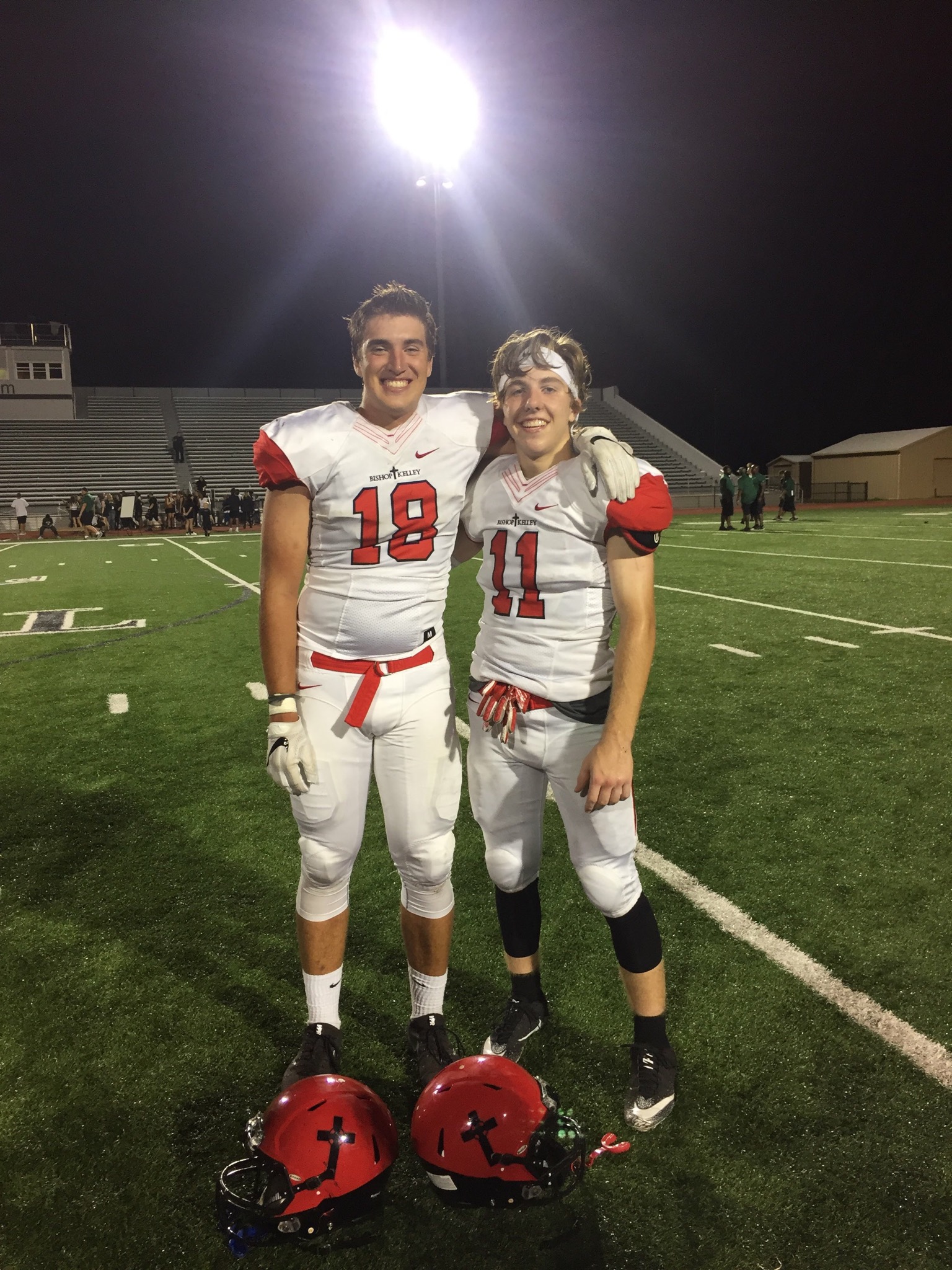Hanisch (right) at Bishop Kelley after a football game with a teammate