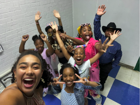 Sydney Brown (bottom left) with her students
