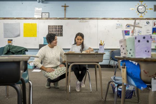 Principal with student