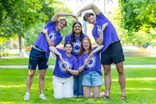 Jacksonville Community making a heart with their hands