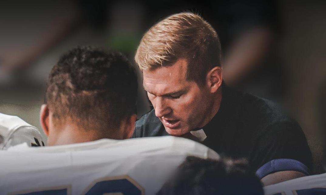 Fr. Nate Wills praying